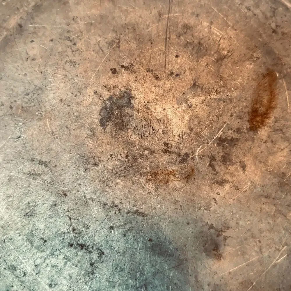 Unknown hammered aluminum